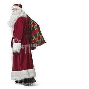 Santa Claus standing with a bag during Christmas