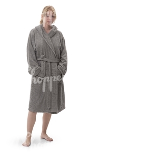 woman in a gray bathrobe standing 