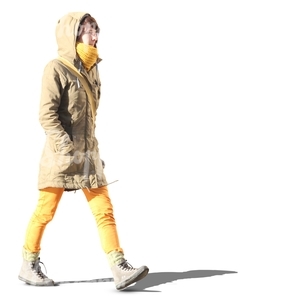 woman in yellow pants walking hands in her pocket