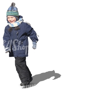 smiling boy running in winter clothes