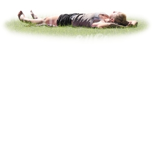 woman lying on her back in a park