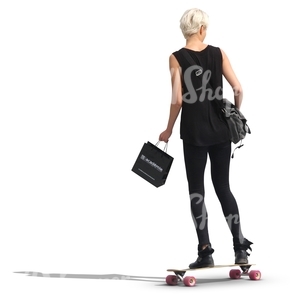 woman in a black outfit riding a skateboard