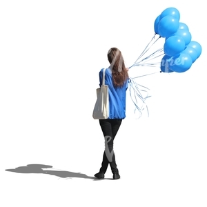 woman standing with a bunch of balloons