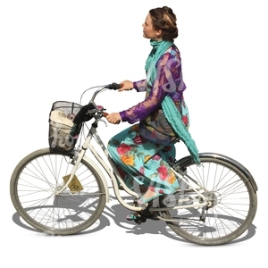 woman in a colorful dress riding a citybike