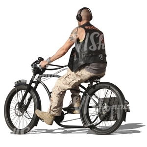 bald man riding a heavy bicycle