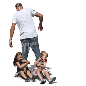 father playing with two girls