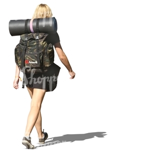 woman walking with a backpack
