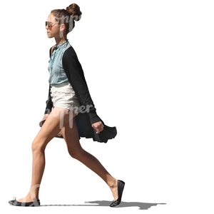 woman in shorts walking on the street