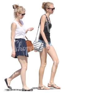 two young women walking on the street