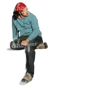 Man with a red bandana sitting