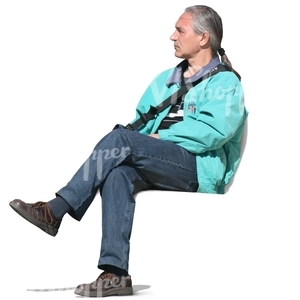 A man with grey long hair sitting
