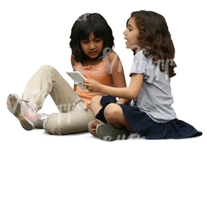 two dark haired girls sitting on the ground and playing