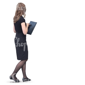 woman in a formal black dress walking