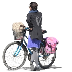 woman standing next to her bicycle