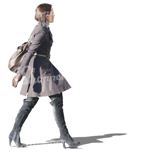 woman in a grey spring coat walking