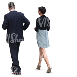 man and woman in formal clothes walking