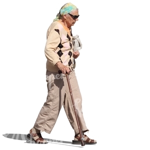 elderly woman with sunglasses walking with a stick