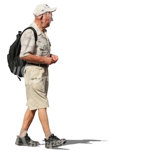 elderly man with a backpack walking