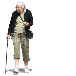 elderly woman with a camera walking with a stick