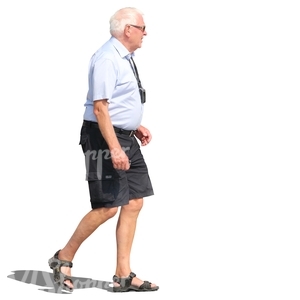 elderly man in shorts walking