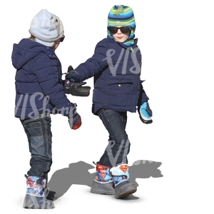 two kids in winter clothes walking