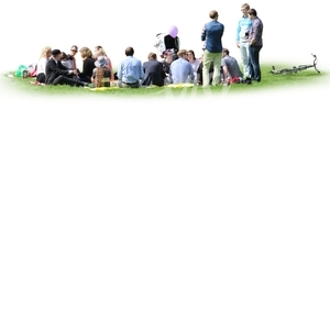 group of people sitting on the grass