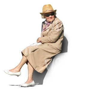 elderly woman in a beige spring coat sitting in the sun