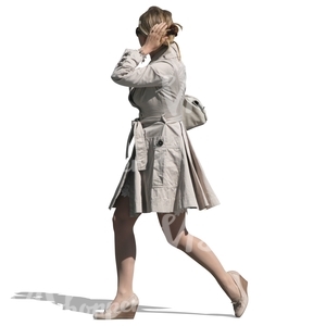 woman in a white coat walking