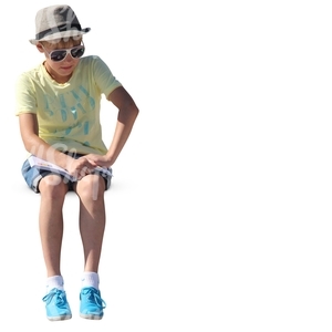 boy with a stylish hat sitting and reading