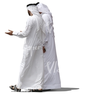 two arab men wearing dishdashas walking