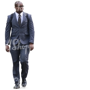 black man in a grey suit walking