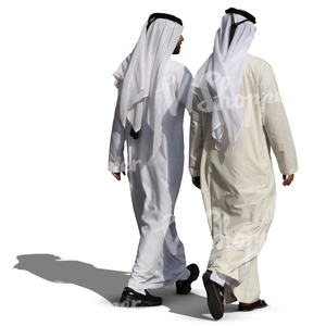 two arab men in white thobes walking and talking