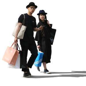 asian couple with shopping bags walking.