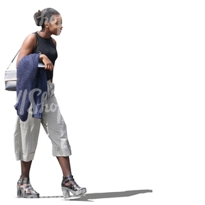 black woman walking in summertime