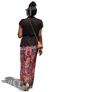 african woman in a long skirt walking