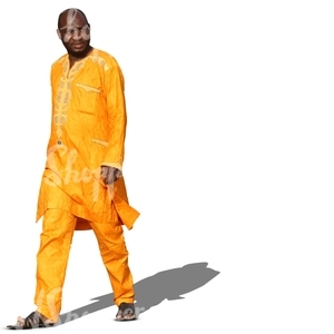 cut out black man in ethnic clothes walking