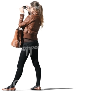 long-haired woman taking a picture