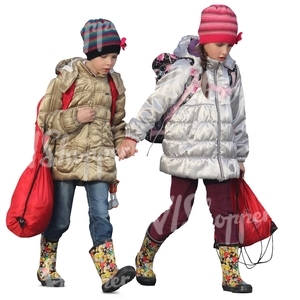 two young girls in autumn coats walking hand in hand