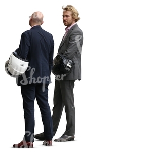 two cut out businessmen with helmets standing