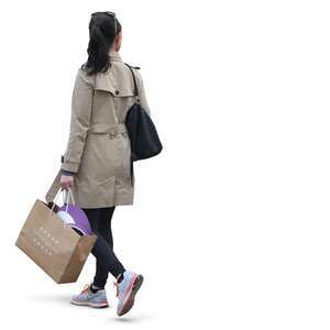 woman with a shopping bag walking