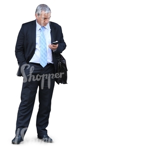 cut out elderly businessman standing and looking at his phone