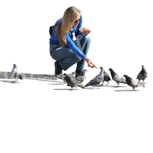 woman feeding pigeons