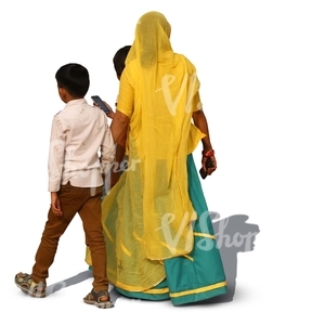 hindu woman wearing a sari walking with her two sons