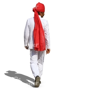 hindu man with a red turban and wearing a white suit walking 