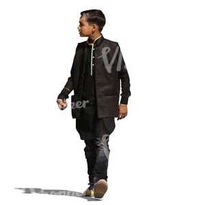 indian boy in a traditional jacket walking