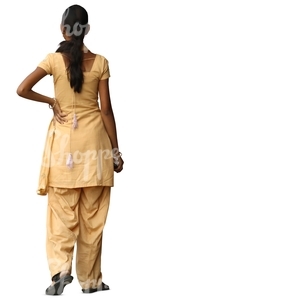 hindu woman in a yellow salwar kameez standing