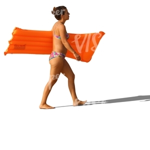 woman in a bikini walking with a floatie