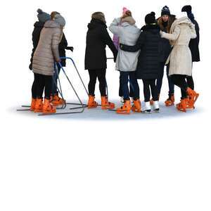 group of women skating in the ice rink