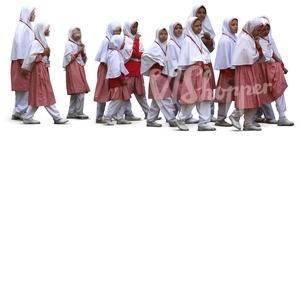 group of muslim schoolgirls walking in a row