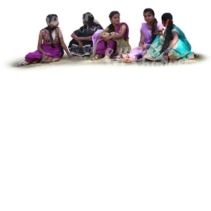 group of indian women sitting on the grass